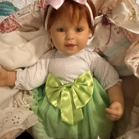 Adorable Baby Doll with Pink Bow - Picture 6 of 9